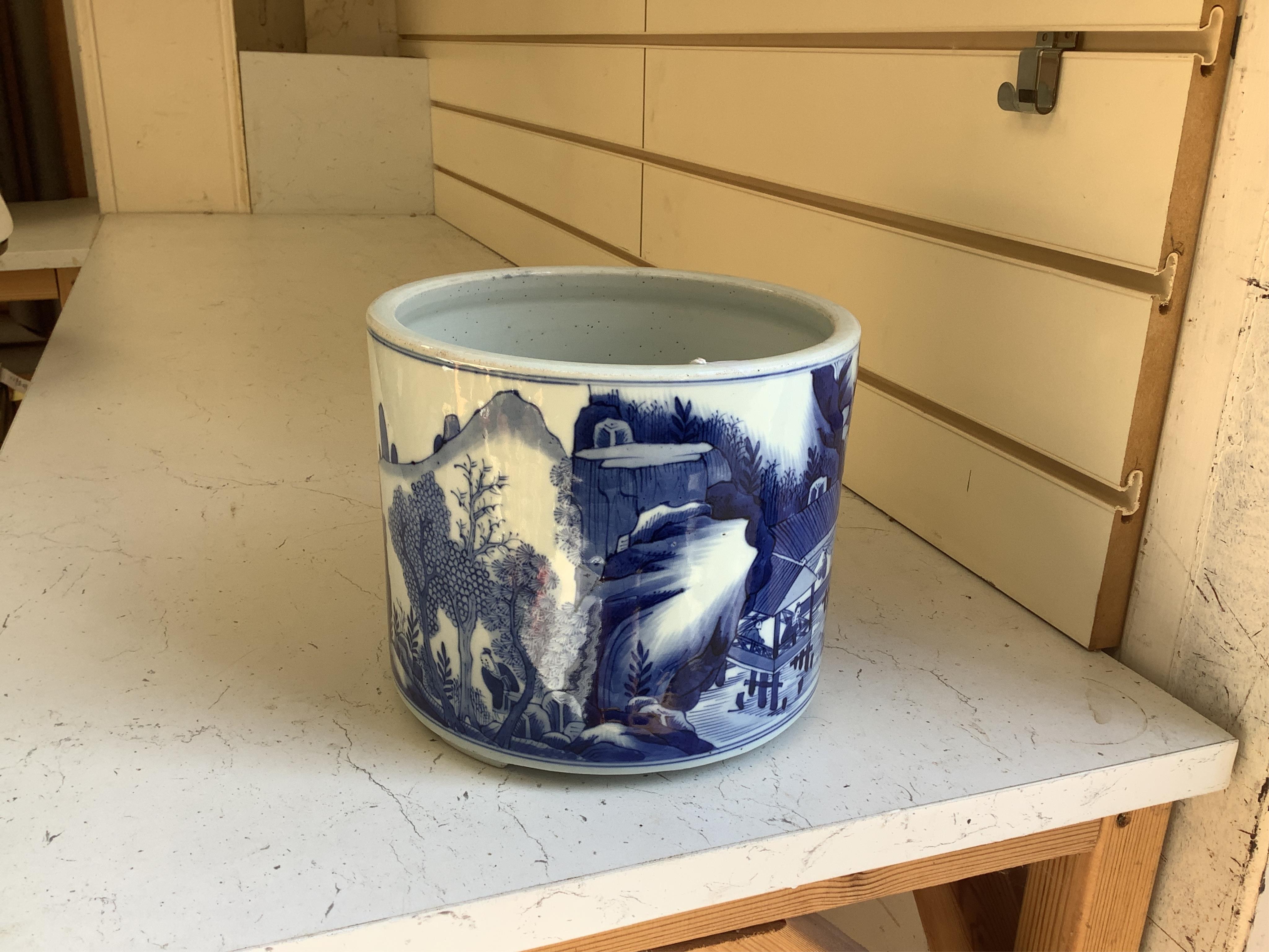 A Chinese blue and white brushpot, 17cm high. Condition - good